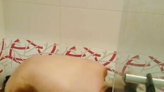 Squatting woman takes a big shit on the shower floor