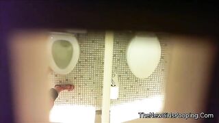 Babe squats over public toilet and takes a dump