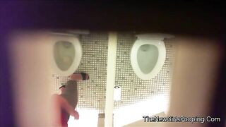 Babe squats over public toilet and takes a dump