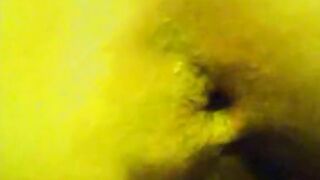 Girl has face full of shit while lying on a bed