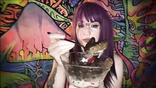 Girl eats shit from a bowl with a spoon
