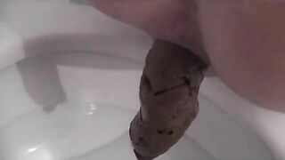 Chick eats shit out of a toilet
