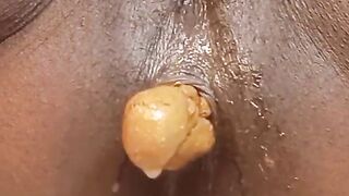 Woman pushes a huge shit out of her ass