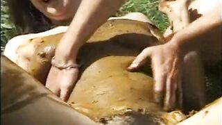 Couple rolls in a huge pile of shit