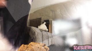 Asshole expels a massive log of shit