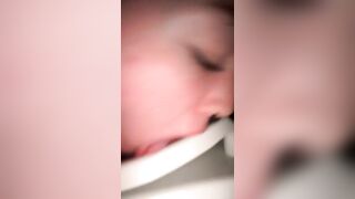 Slut drinks a huge mouth full of piss from a dildo