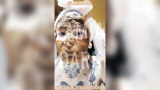 Girl smears shit all over her face and body