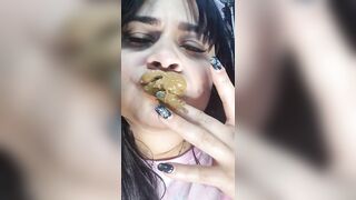 Girl eats her own shit between her fingers