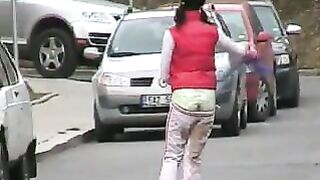 Girl fills her diaper with shit in a bathroom