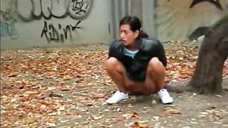 Woman takes a huge shit on a park bench