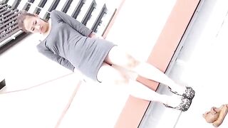 Asian woman shits on a roof
