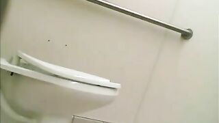 Woman squats on toilet and pees for a long time
