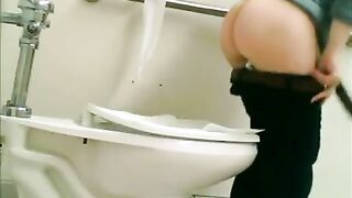 Woman squats on toilet and pees for a long time