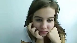 Girl plays with her tits in a black bra