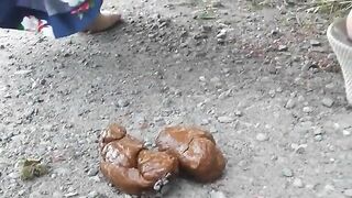 Girl Bends Over & Drops A Big Shit Outside