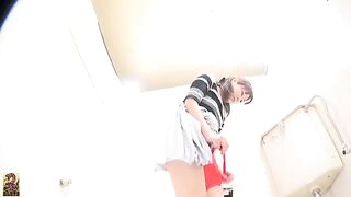 Girl shits on white toilet in school uniform