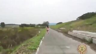 Girl in diaper takes a shit outside on the street