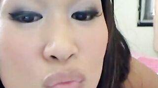 Girl spreads her ass and plays with her shit on a bed