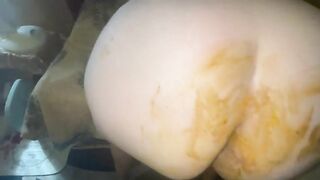 Girl spreads her ass cheeks showing shit in butt crack