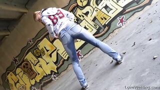 Woman pulls down pants to reveal her ass