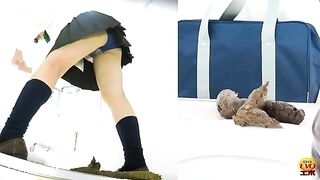 Schoolgirl spreads ass cheeks and pisses in a toilet