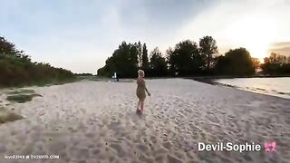Babe squats to take a shit right on the beach