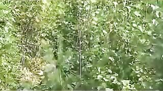 Dirty girl takes a piss outdoors in her green dress