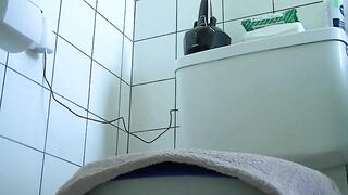 Girl squats on the toilet and takes a big shit