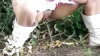 Girl squats and shits in her shorts