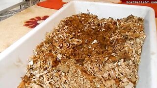 Women eat shit out of a tray together