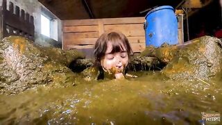 Girl plays in a shit-filled pit
