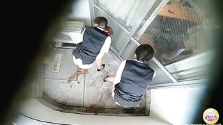 Two girls push shit onto each others faces