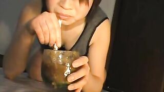 Girl drinks piss from a cup