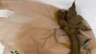 Woman squeezes out a shit from her asshole