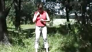 Babe fucks a log in the woods