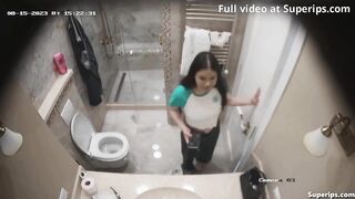 Man in mask takes a shit in the bathroom while on his phone