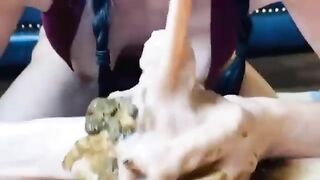 Girl eats shit out of another girl's ass