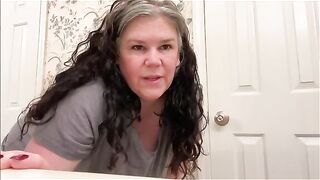 She takes a huge shit, then plays with it