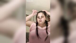 Girl fills a glass with her piss