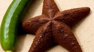 Starfish cartoon has a cucumber filled with shit in its mouth