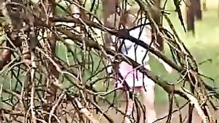 Nude blonde girl takes a massive shit outside in the woods