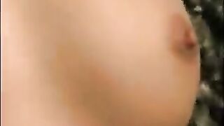 Girl squats in the grass and eats her own shit