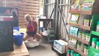 Woman takes a shit on a white blanket in a store