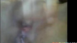 Girl fucks a butt plug while holding her ass cheeks apart