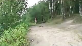 Girl in high heels takes a piss on a dock