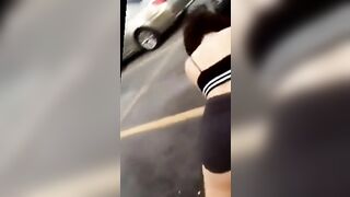 Girl bends over and squirts piss on the street