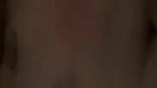 Babe in pink suit fucks her inflatable tits in her bathroom while eating shit