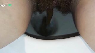 Man shits in the toilet, and then he wipes his ass with toilet paper.