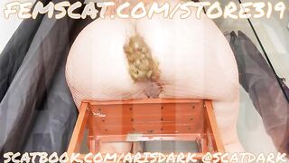 Big assed woman takes a shit in a plastic tray