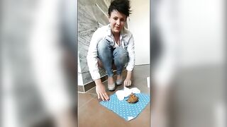 Girl spreads her ass over a pile of shit